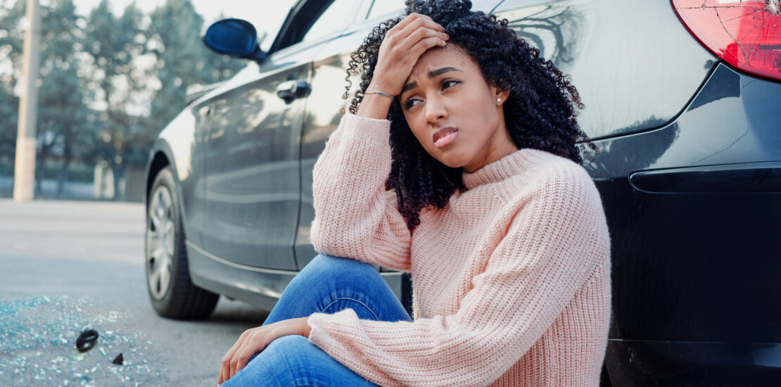 Post Car Accident Considerations - Black woman portrait after bad car accident